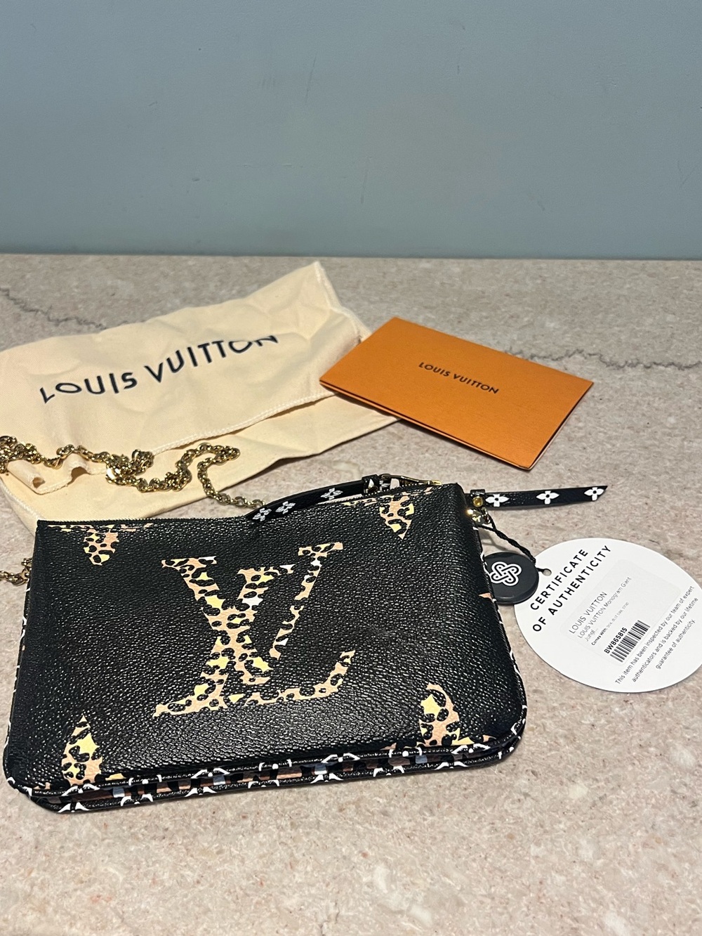 LOUIS VUITTON
Double Zip Jungle Pochette Giant Monogram Leather Crossbody Bag - Picture 5 of 15